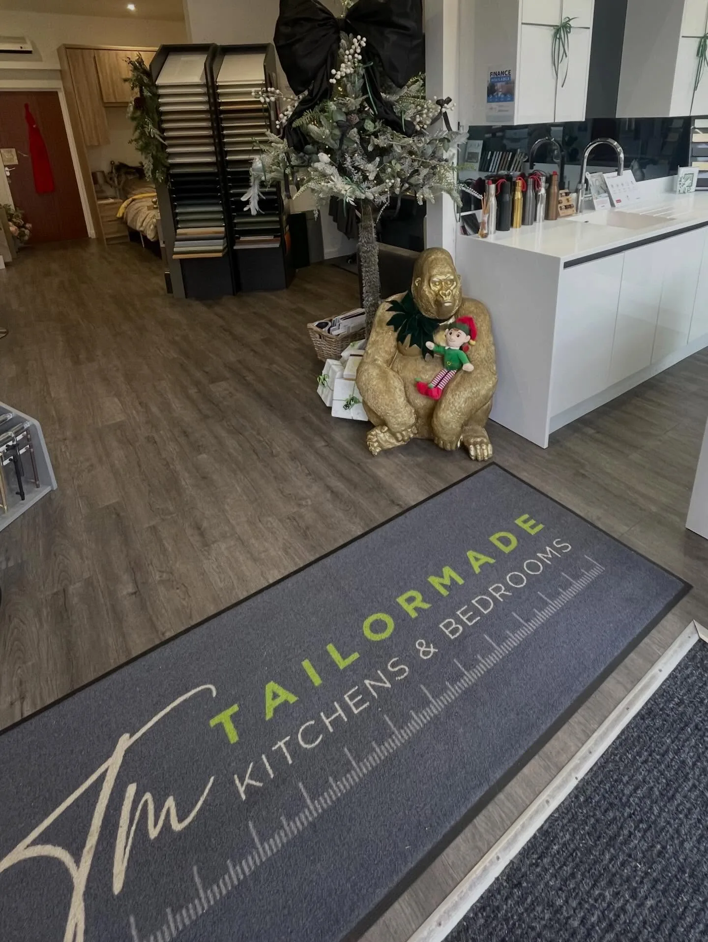 Inside the Tailormade Kitchens & Bedrooms showroom in Royton, showing kitchen displays and material samples
